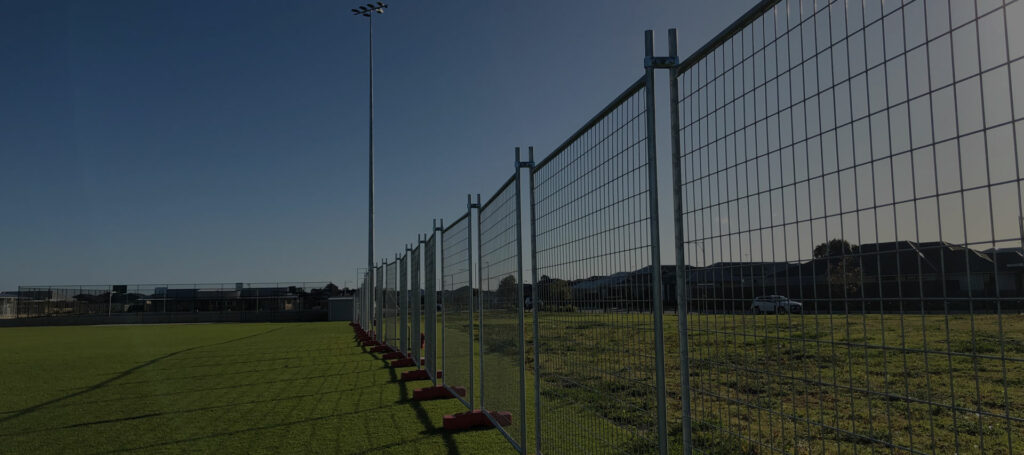 Temporary fencing at an oval in Perth for construction and security purposes